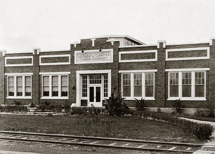 The company moves into a new building on the southern edge of town. Although our campus grows over the years, Draper® remains in the same location. The building in this photo is later significantly expanded, but still houses our offices today. 